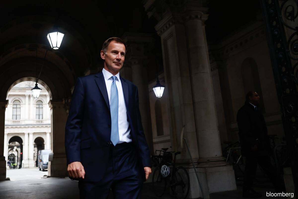 New chancellor warns UK faces tax rises in clear sign 'Trussonomics' is over